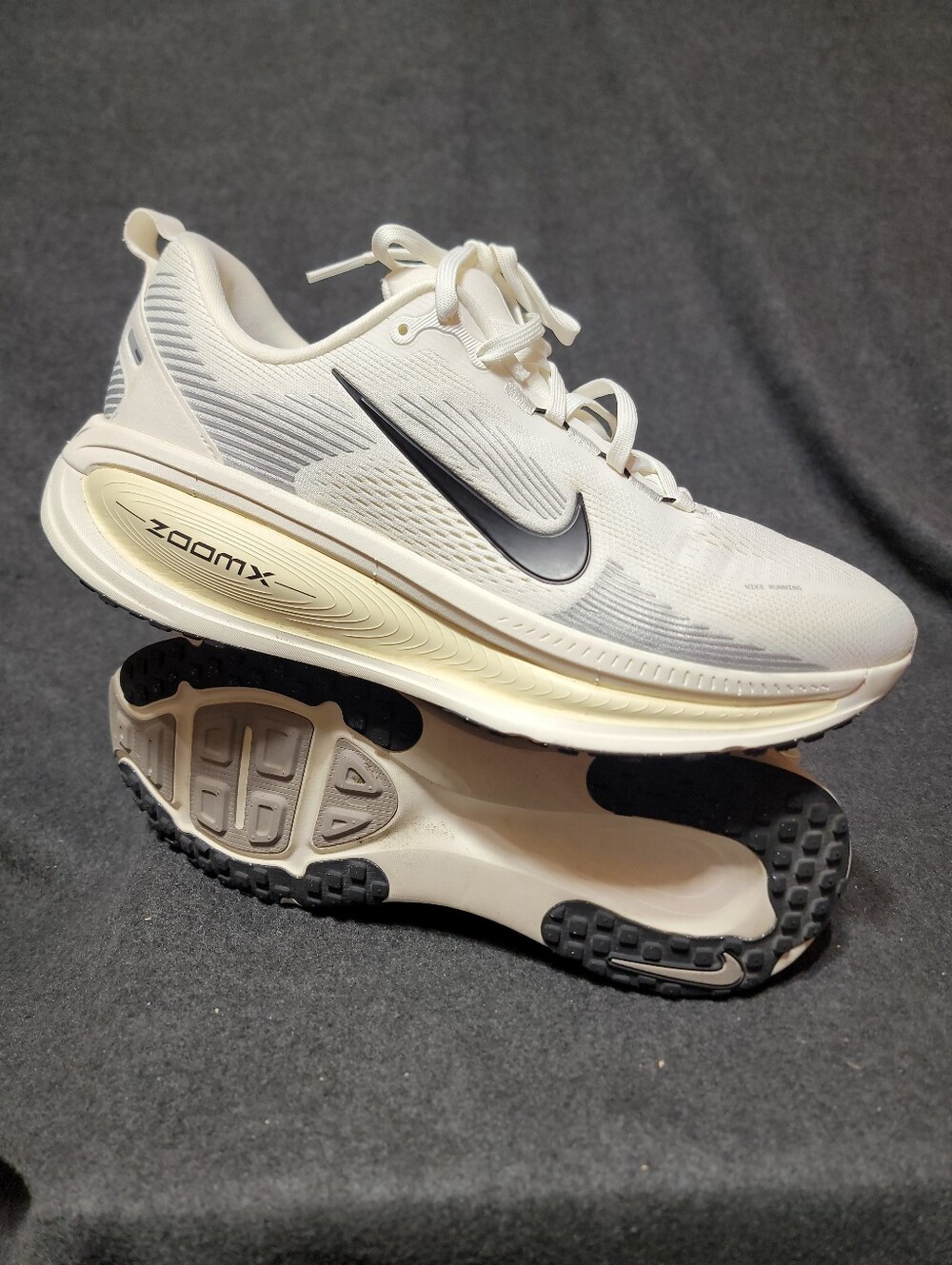 Nike Vomero 18 in the "Summit White/Coconut Milk/Black" colorway